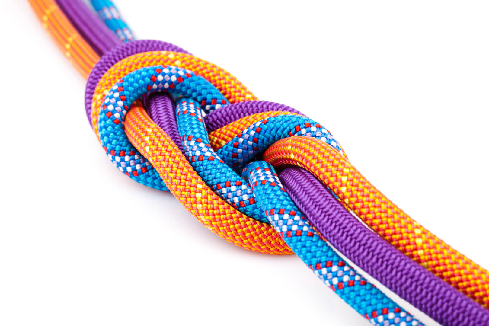 Three colored ropes tied into a knot